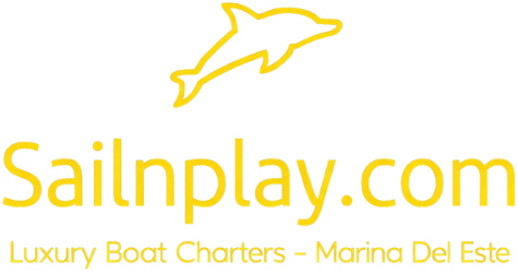 Yellow text logo with dolphin silhouette, reads 'Sailnplay.com Luxury Boat Charters - Marina Del Este'.